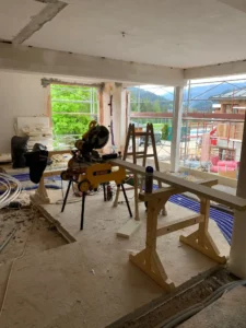 View of the interior work at Hofgut Wagrain - where the building site will soon be transformed into alpine living dreams. With panoramic views, natural materials and precise craftsmanship, a new place of cosiness is being created for families and connoisseurs.