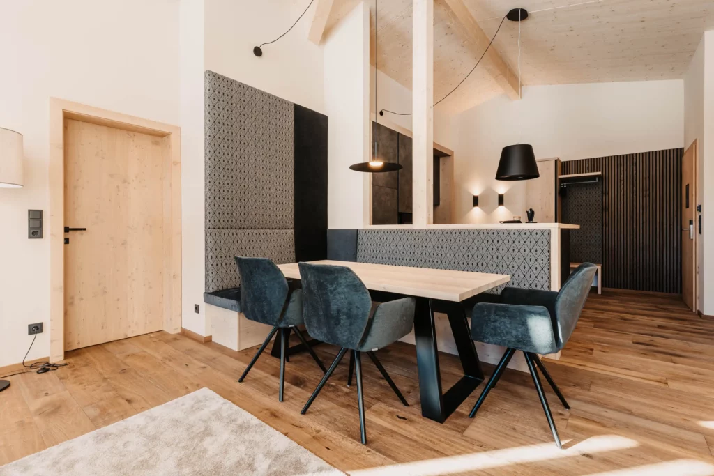 Stylish dining area in the Hofgut Penthouse - alpine chic meets modern design.