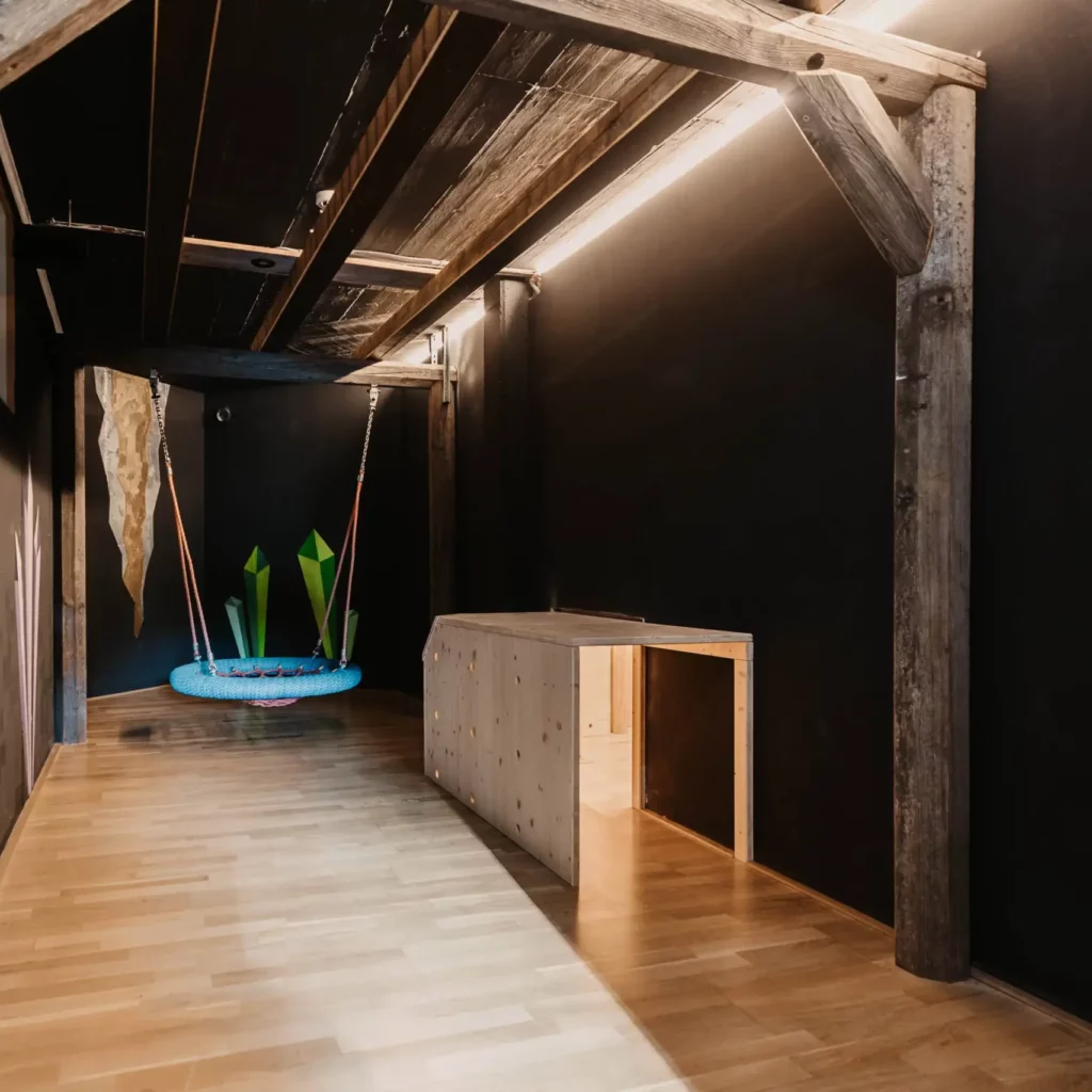 Hofgut-aparment-lifestyle-resort-wagrain-134 Secret passage and nest swing at Hofgut Wagrain - an imaginative retreat for swinging, hiding and dreaming.