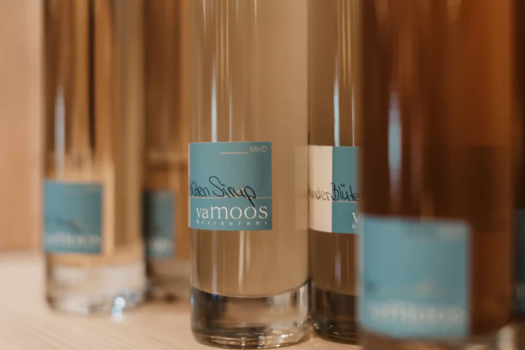Hofgut-apartment-lifestyle-resort-wagrain 29 Homemade blossom syrup from the vaMoos restaurant - lovingly bottled in stylish bottles.