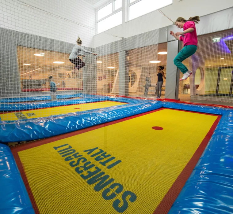 Hofgut_Games Area_Trampolin Indoor trampoline fun for children at the Hofgut Wagrain family resort.