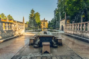 Baroque trick fountains in Hellbrunn Palace Park in Salzburg in the sunshine, ideal for a family outing.