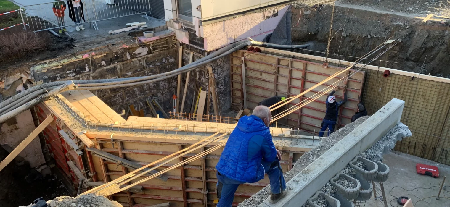 Civil engineering work at Hofgut Wagrain - construction site with foundations and formwork.