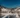 Das Hofgut Wagrain eingebettet in die verschneite Winterlandschaft – alpine Idylle und Ruhe mit Weitblick über die Berge des Salzburger Landes.